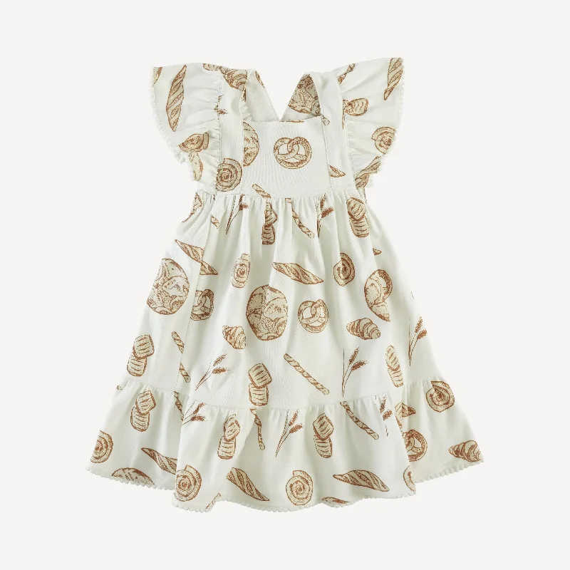 ruffle strap pom pom dress | warm bread | organic cotton interlock